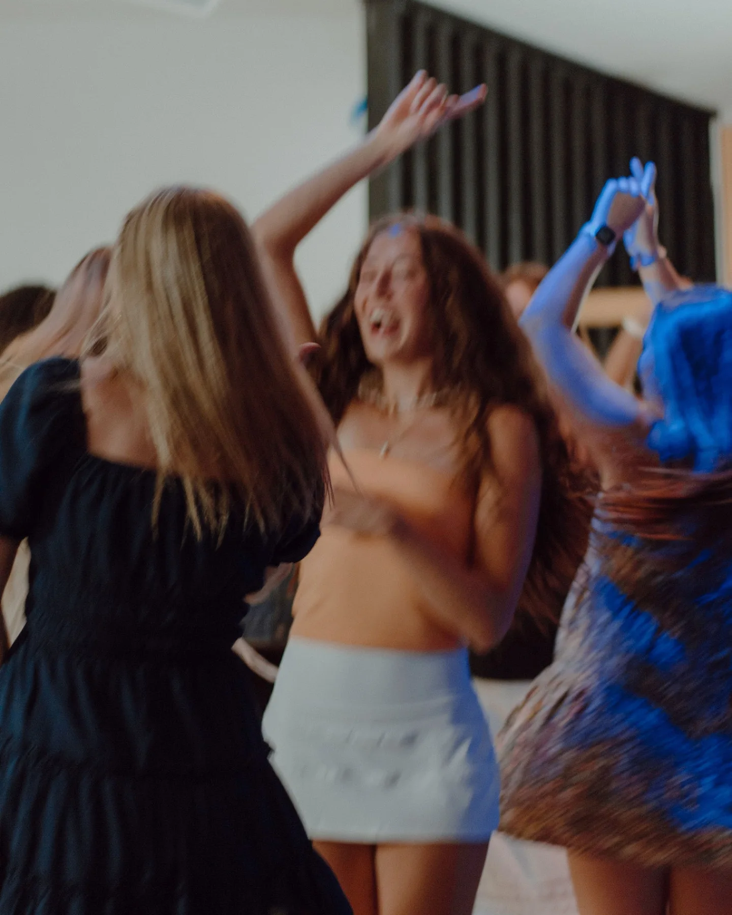 Women celebrating together at an Ezer event